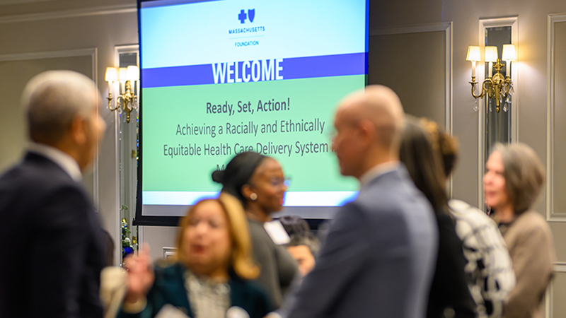 Group of people talking at an event
